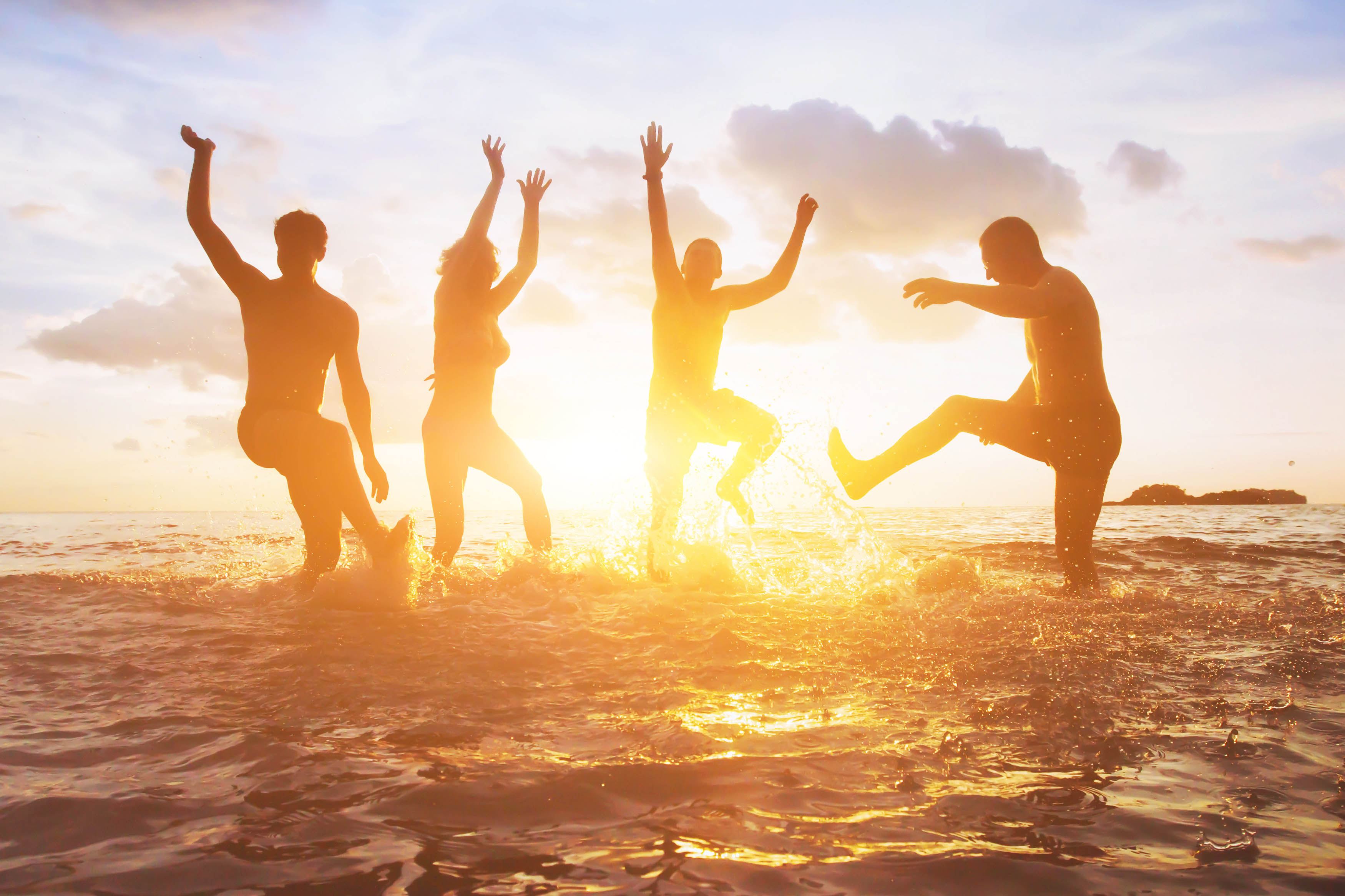 Group splashing in the sunshine in a lake Group splashing in the sunshine in a lake